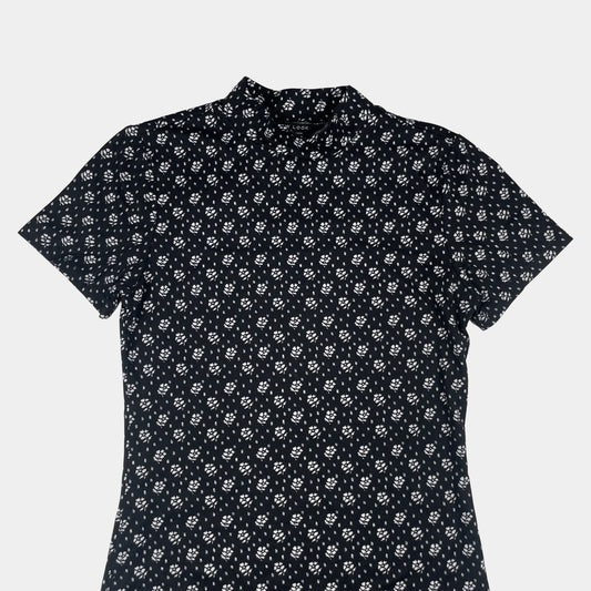 Schwarzes Kleid mit weißen Blumenmuster für Mädchen 140-146 cm – detail