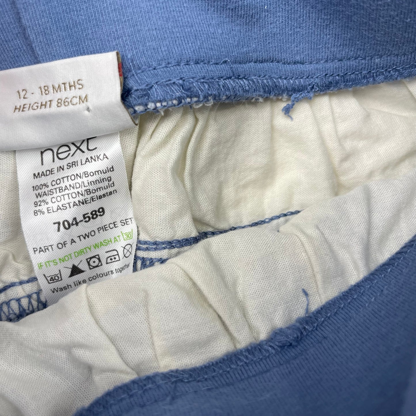 Blau-weißer karierter Rock mit Rüschen für Kleinkinder – label