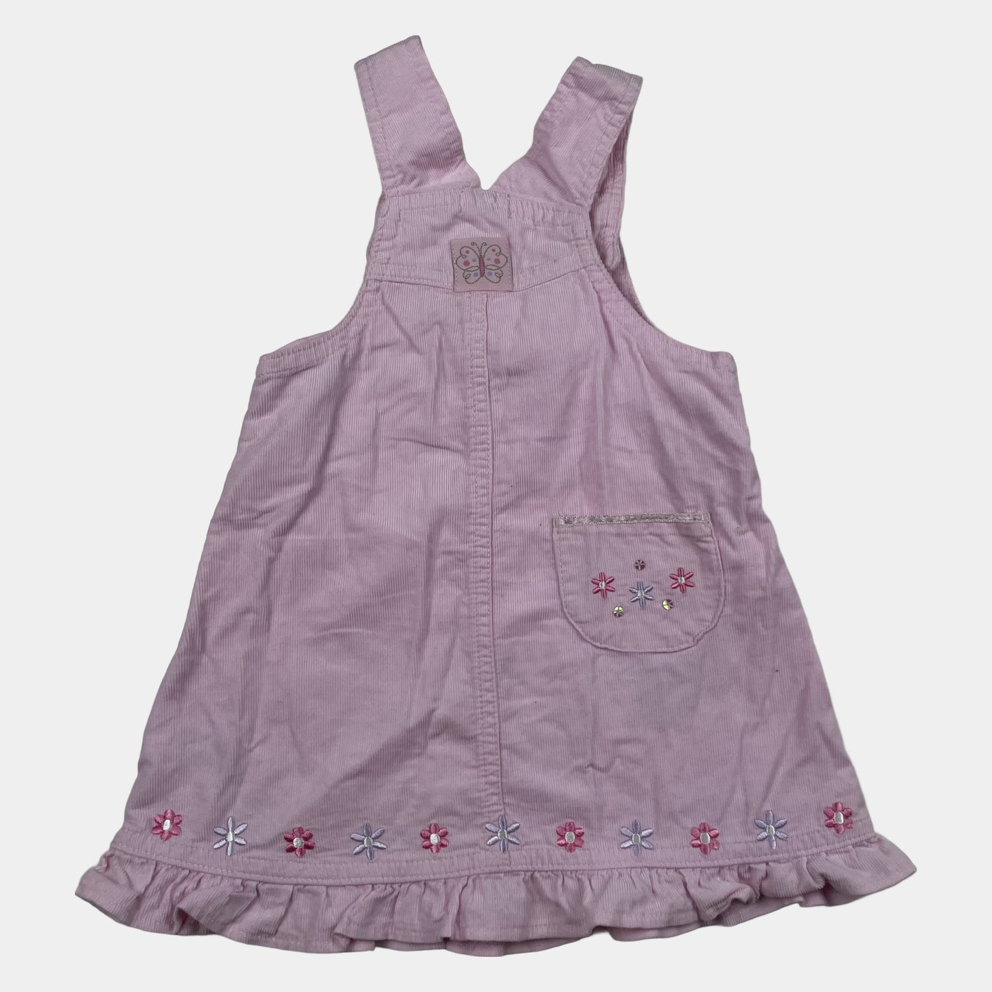 Rosa Cord-Kleid mit Schmetterlingsmotiv und Rüschen – back