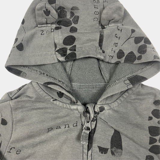 Graue Kapuzenjacke mit Pinguin-Muster – detail