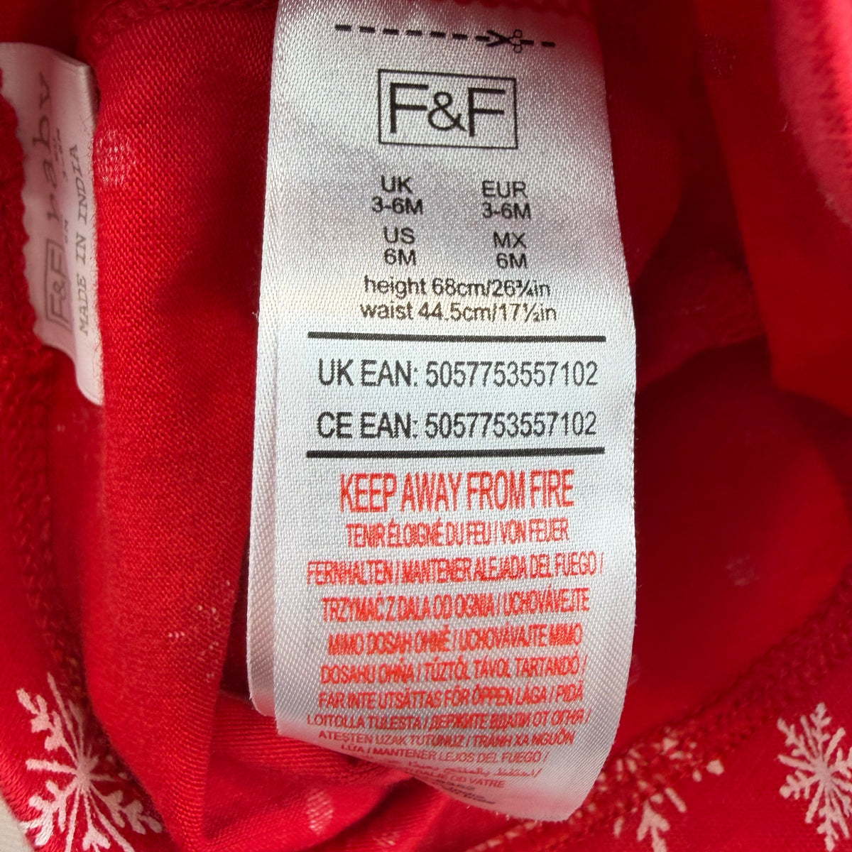 Rote Baby-Leggings mit weißem Schneeflocken- und Punkte-Print – label