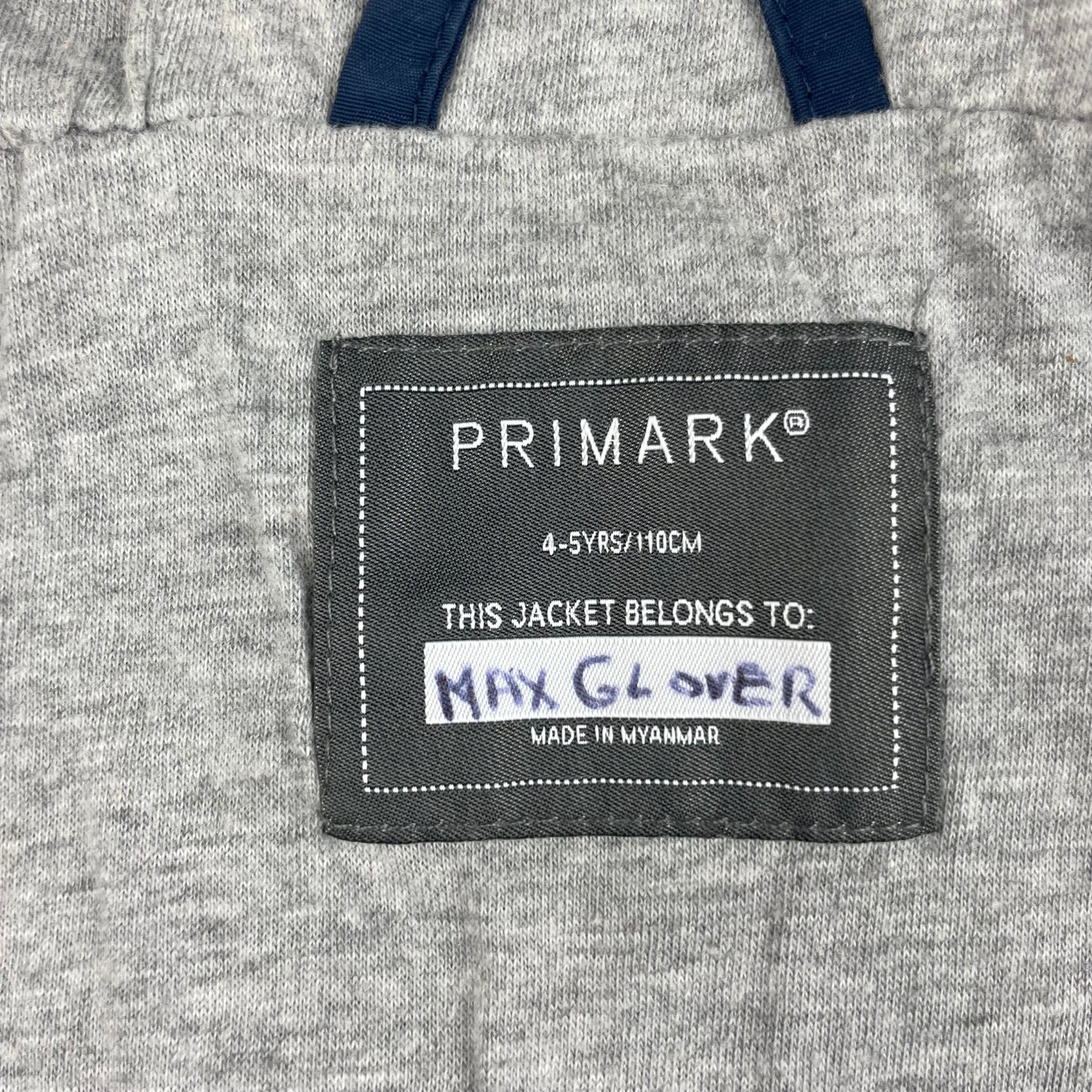 Blaue Kinderjacke mit Kapuze und Reißverschlüssen – label