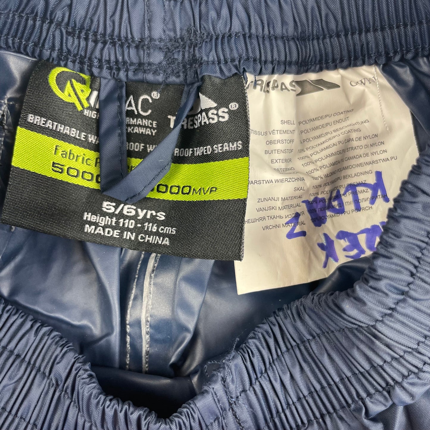 Blaue Trespass Regenhose für Kinder 5-6 Jahre – label