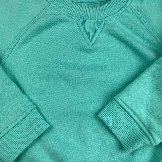 Mintgrüner Pullover aus Baumwoll-Polyester-Gemisch mit gerippten Bündchen für Kinder, Größe 1,5-2 Jahre. – detail