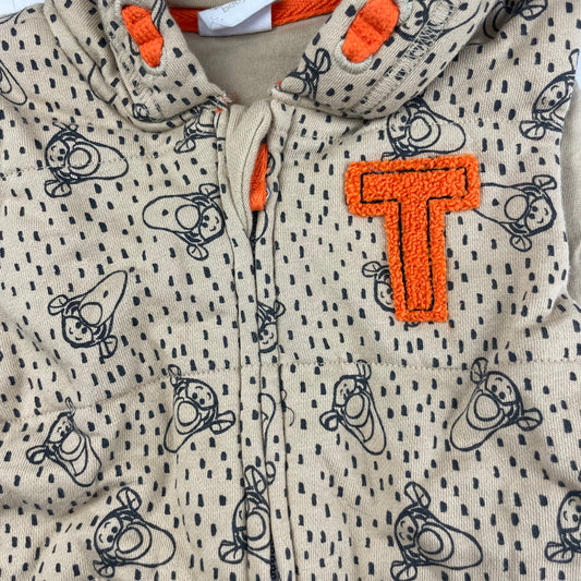 Beige Weste mit Kapuze und spacigem Muster – detail