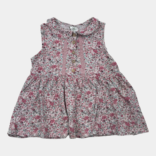 Rosa Kinderkleid mit Blumenmuster und Knopfleiste – front