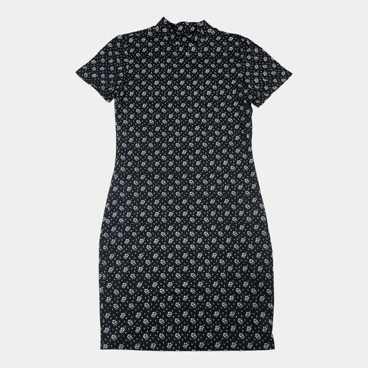 Schwarzes Kleid mit weißen Blumenmuster für Mädchen 140-146 cm – front