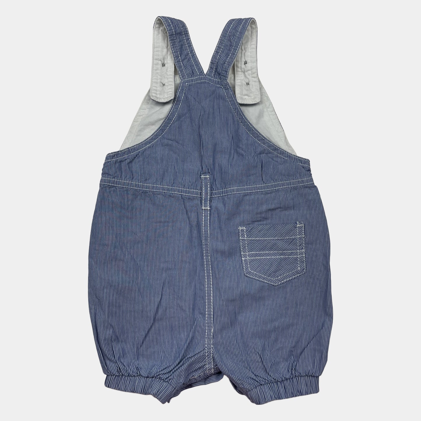 Blauer Baumwoll-Overall mit Dino-Muster für Kinder – back