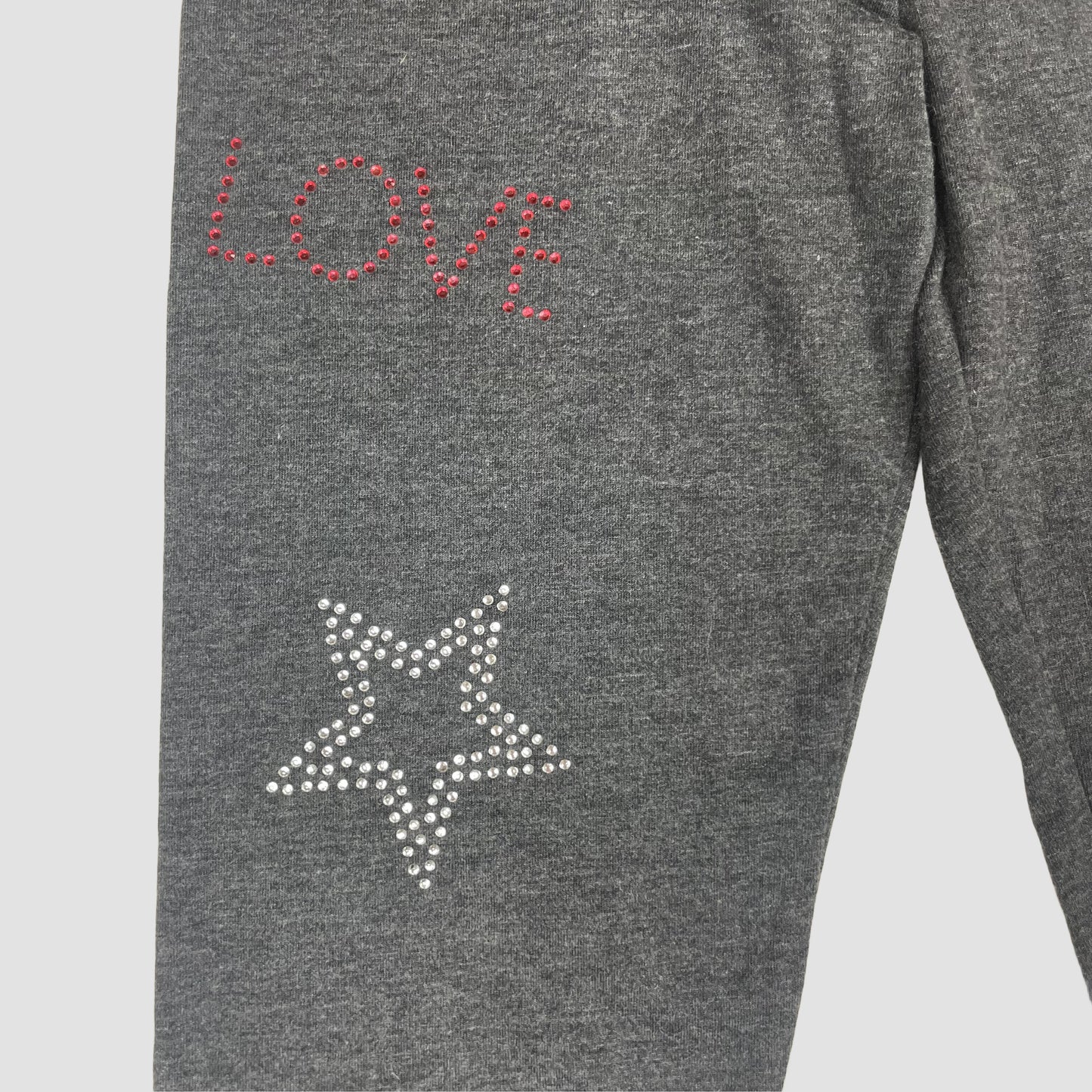 Dunkelgraue Leggings mit Herz- und Stern-Nieten von George, Größe 9–10 Jahre – detail