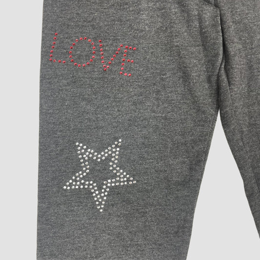 Dunkelgraue Leggings mit Herz- und Stern-Nieten von George, Größe 9–10 Jahre – detail