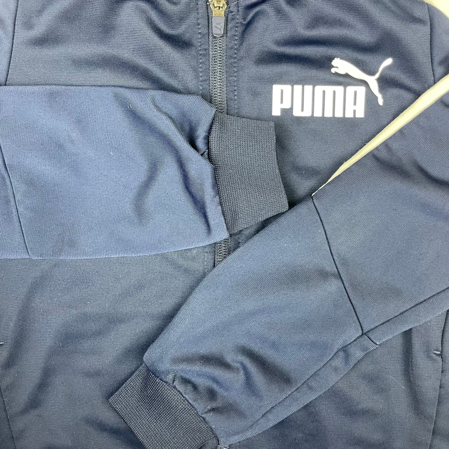 Puma Kinder Trainingsjacke navy mit hellgrauen Einsätzen, Größe 128 – sleeve