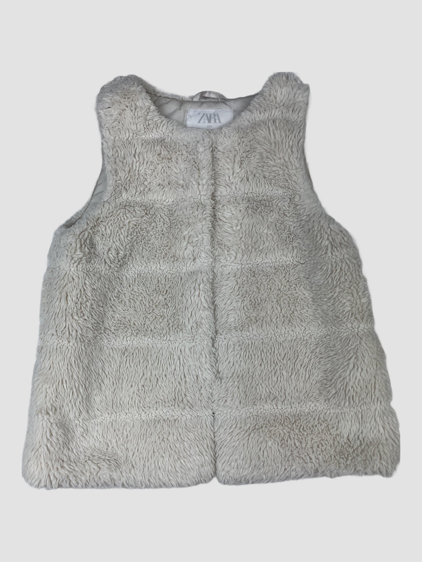Beige ZARA Kids Kunstfell-Weste, Größe 6–7 Jahre – front