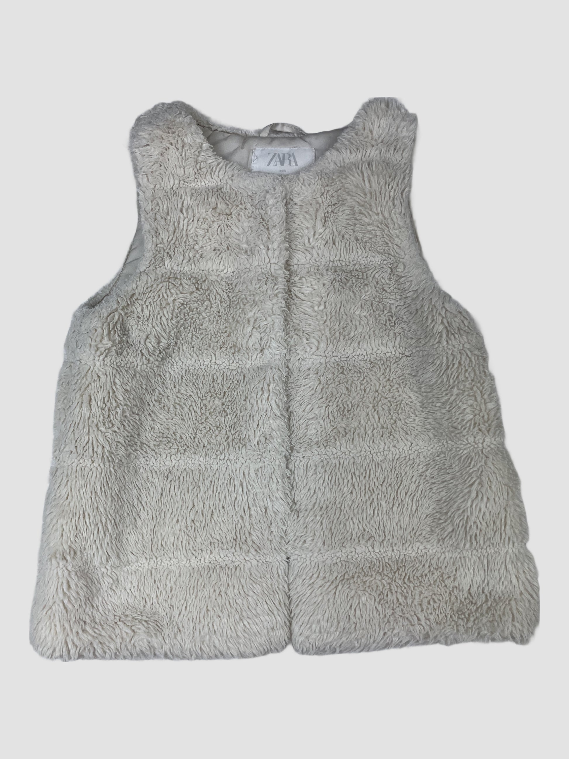 Beige ZARA Kids Kunstfell-Weste, Größe 6–7 Jahre – front