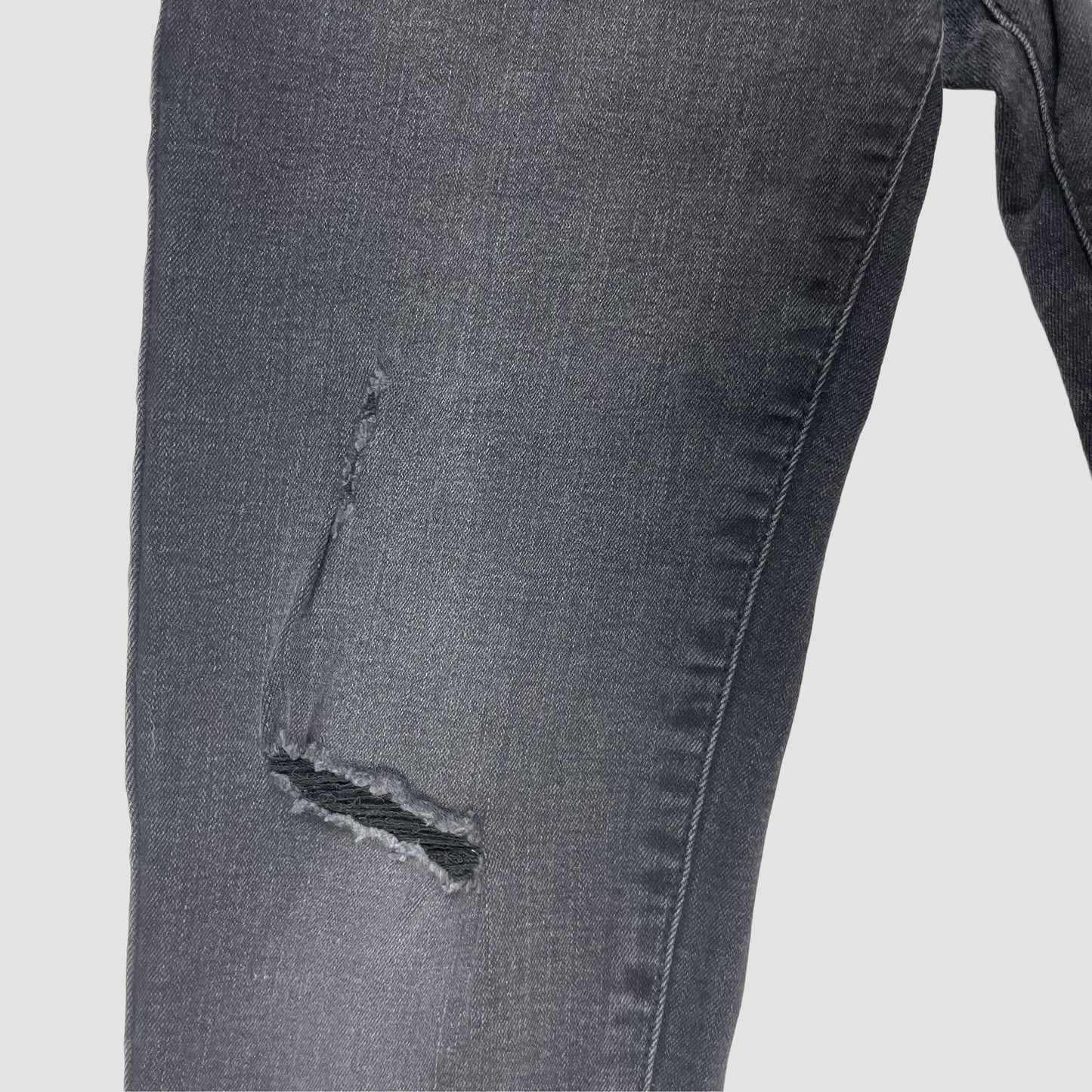 Schwarze Skinny-Jeans für Kinder, Größe 146 (10–11 Jahre), mit Rissen und Fransensaum – inside