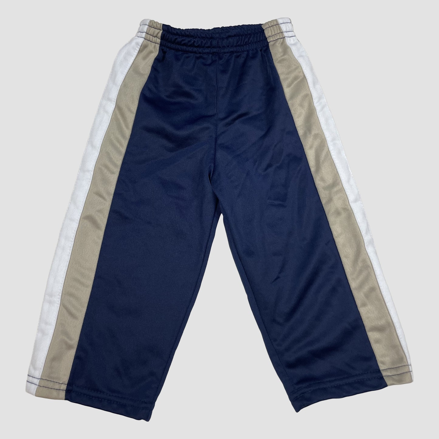 Dunkelblaue Kinder-Trainingshose mit beige-weißen Seitenstreifen