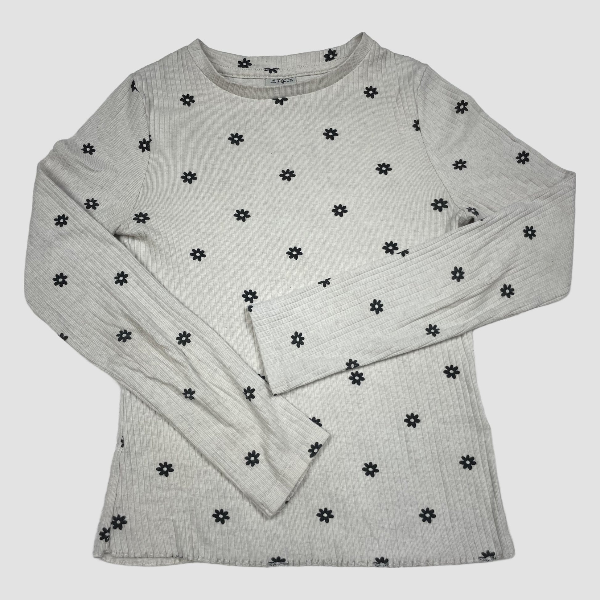 Beiges F&F Langarmshirt mit schwarzen Blumen, Rippstruktur, Größe 10–11 Jahre – front