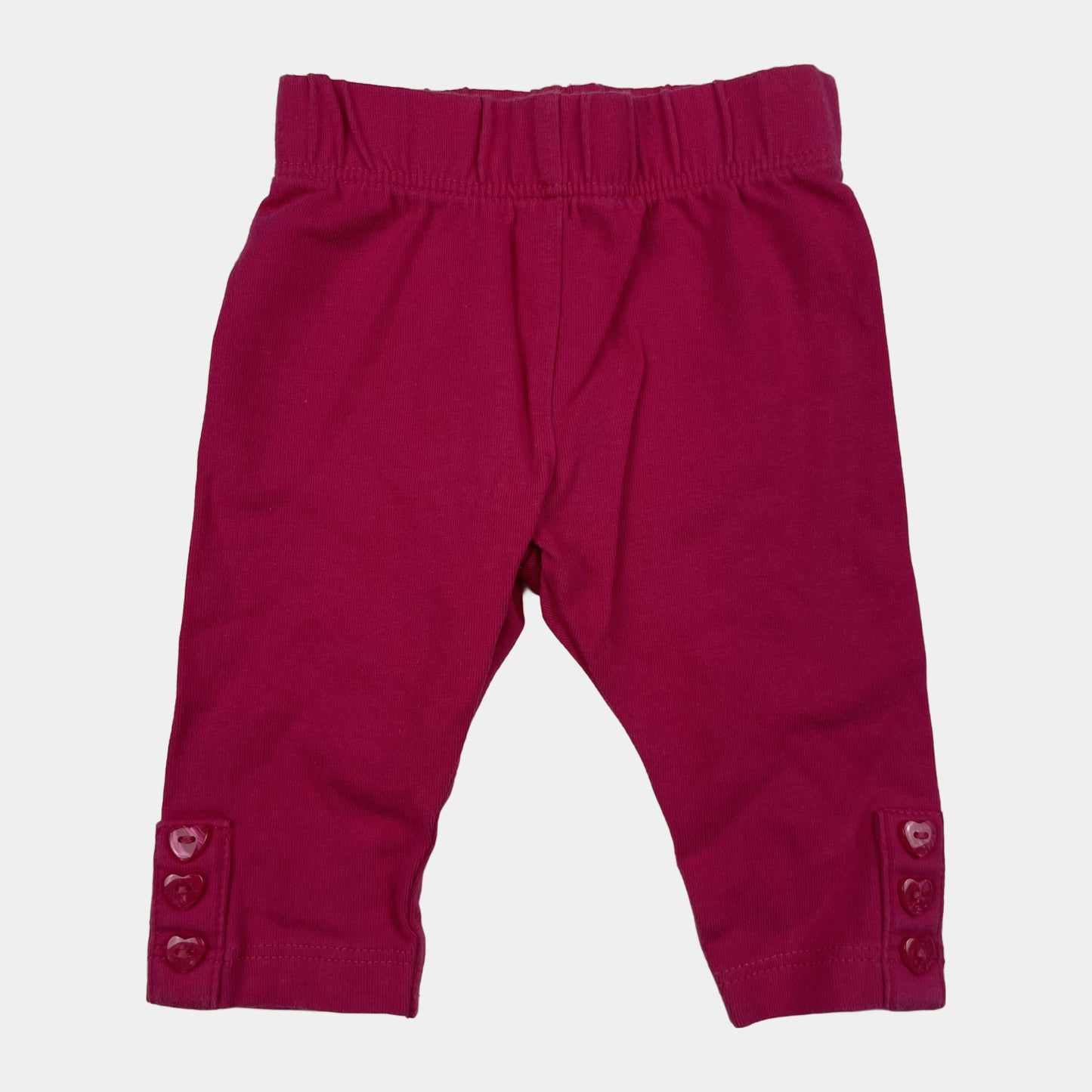 Fuchsiafarbene Baby-Leggings mit Herz-Knöpfen, Größe First Size – front