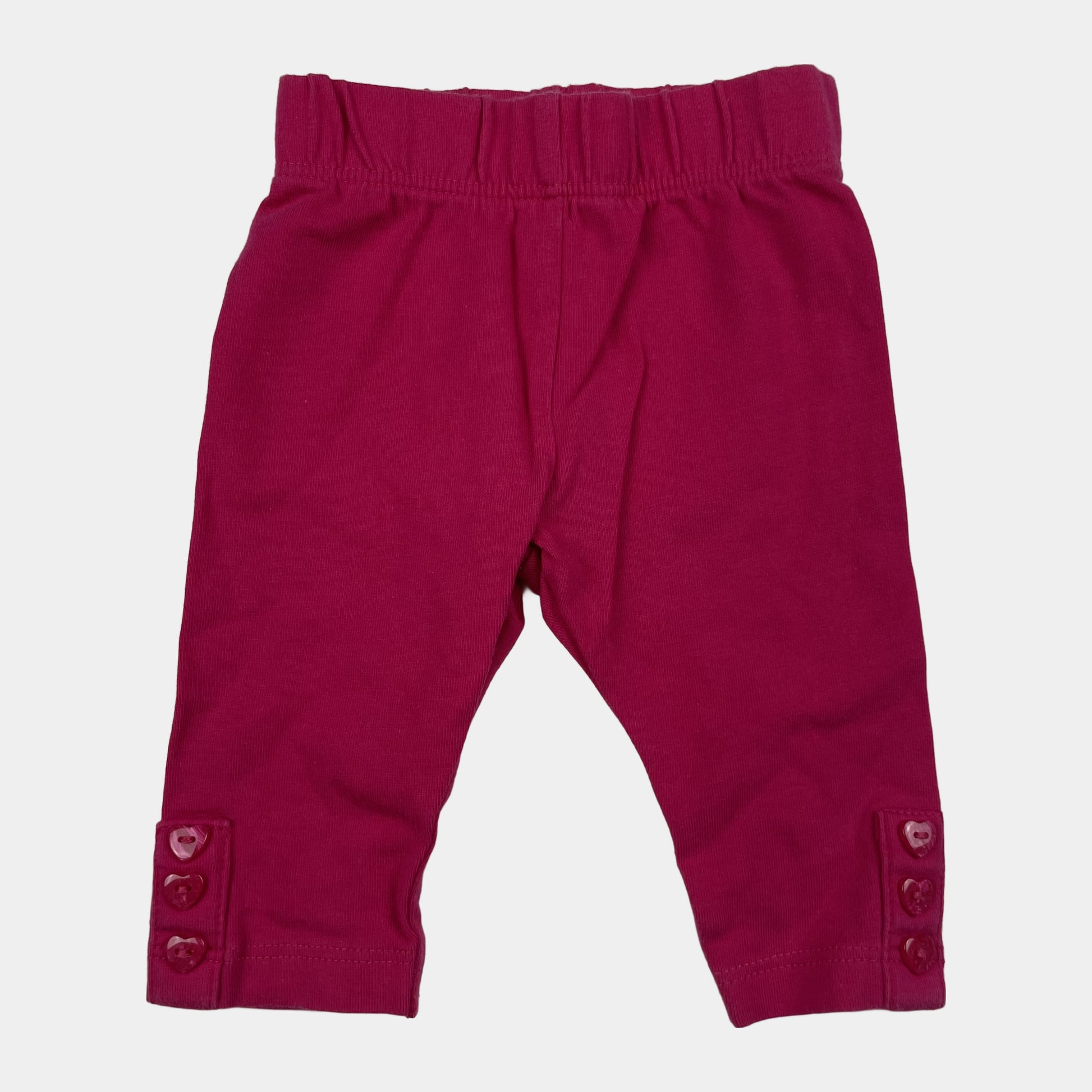 Fuchsiafarbene Baby-Leggings mit Herz-Knöpfen, Größe First Size – front