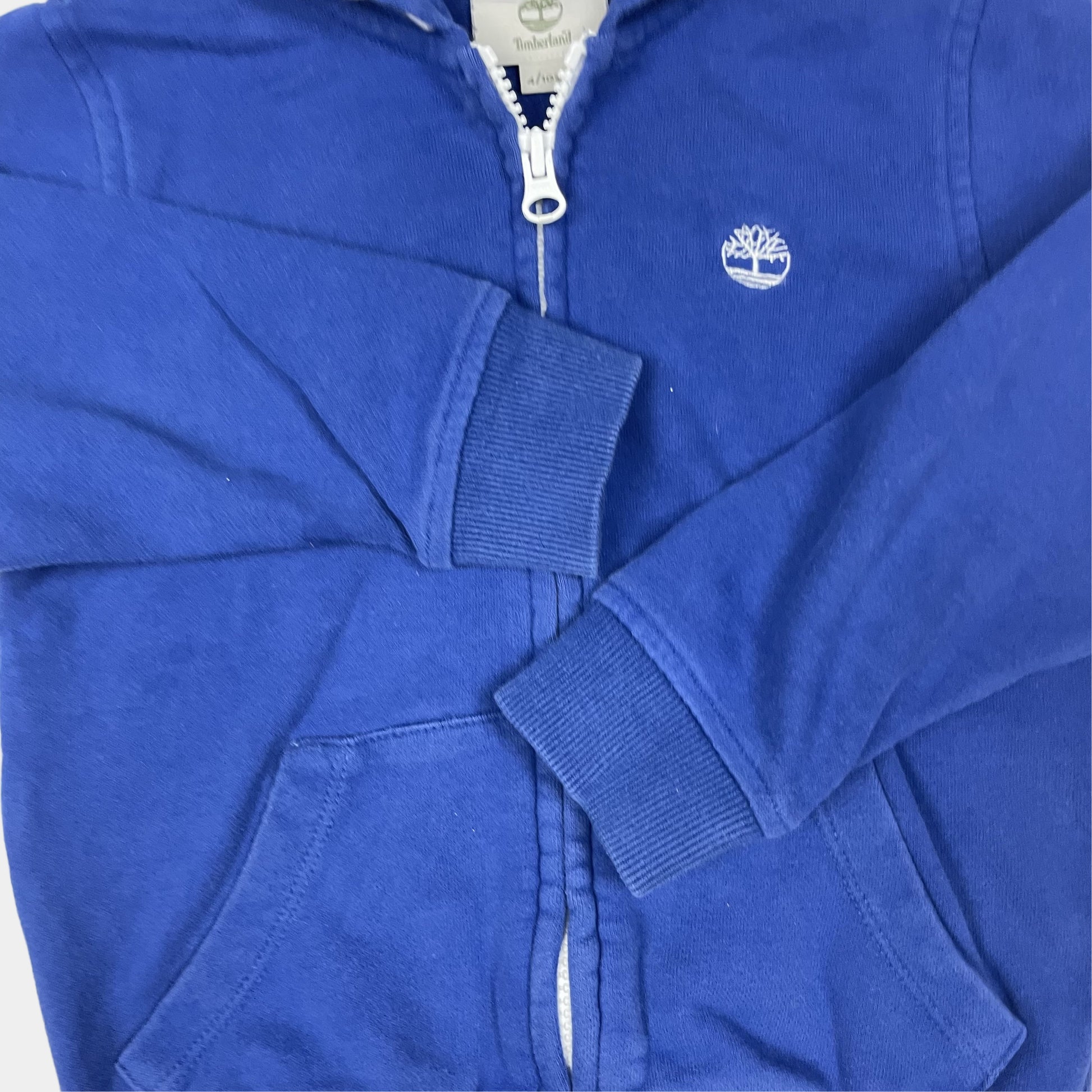 Blaue Kapuzenjacke mit Logo von Timberland für Kinder, Größe 4 Jahre – detail