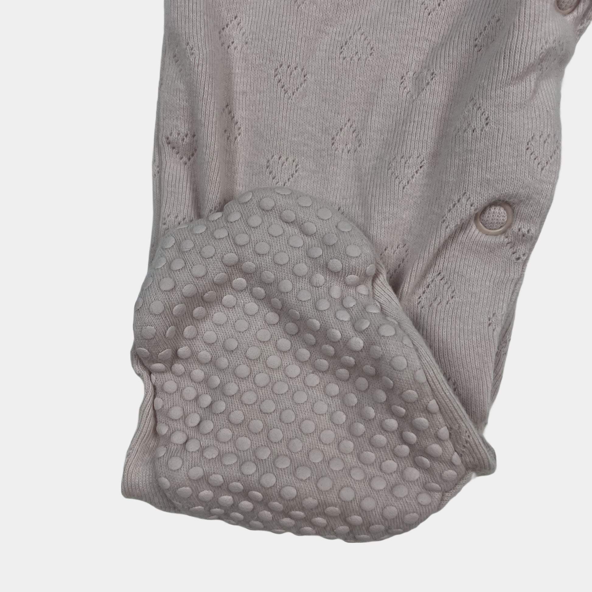 Rosa Baumwoll-Overall mit Blumenapplikation – sleeve