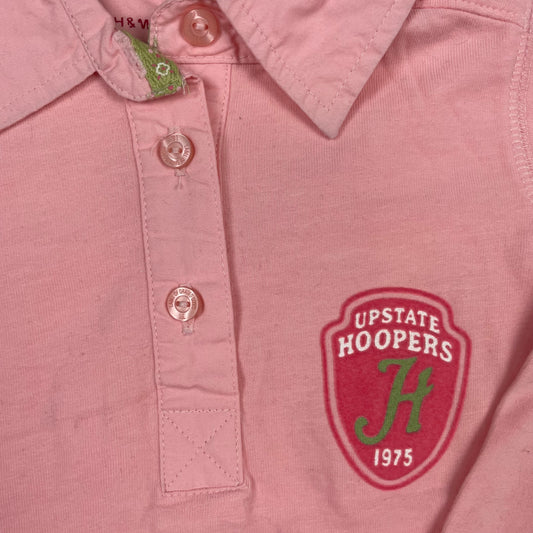 Rosa Langarm-Polo aus Baumwolle mit Logo-Aufdruck auf der Brust. – detail