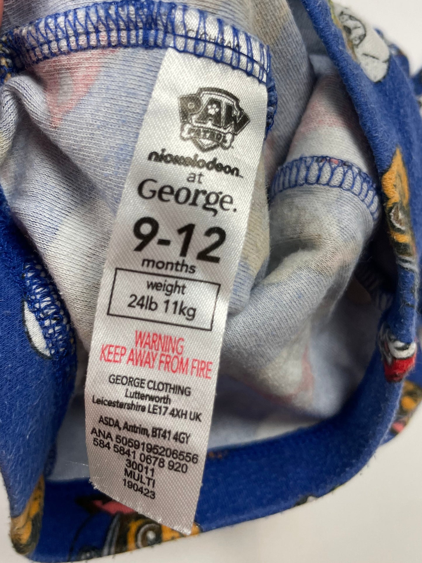 Blaue Schlafanzug-Hose mit Kindermotiven – label