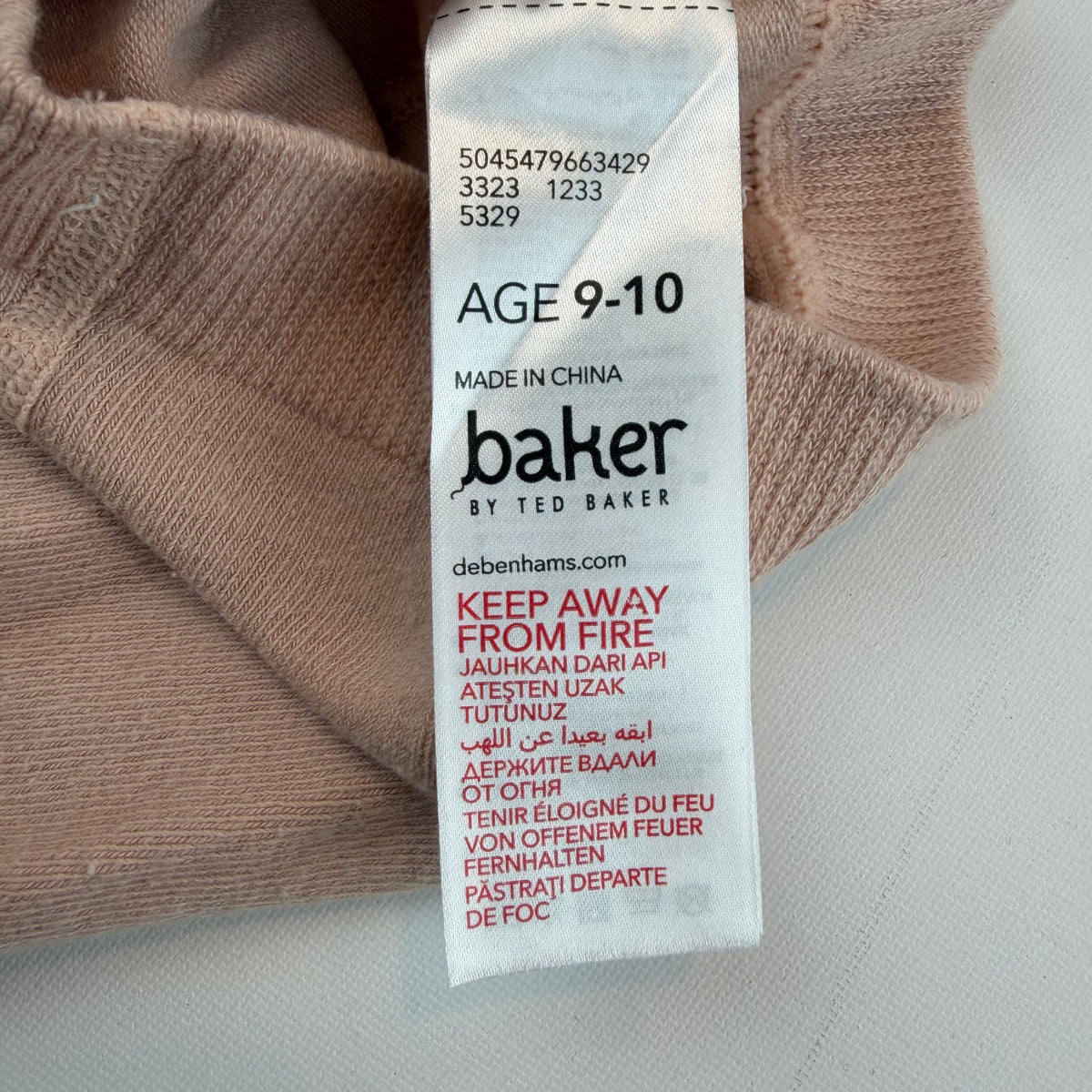 Beige Glitzer-Strumpfhose für Kinder mit baker-Schriftzug am Fuß – label