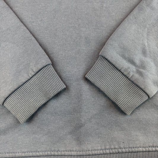 Blaues Kinder-Sweatshirt mit Dino-Stickerei und Rippbündchen – detail