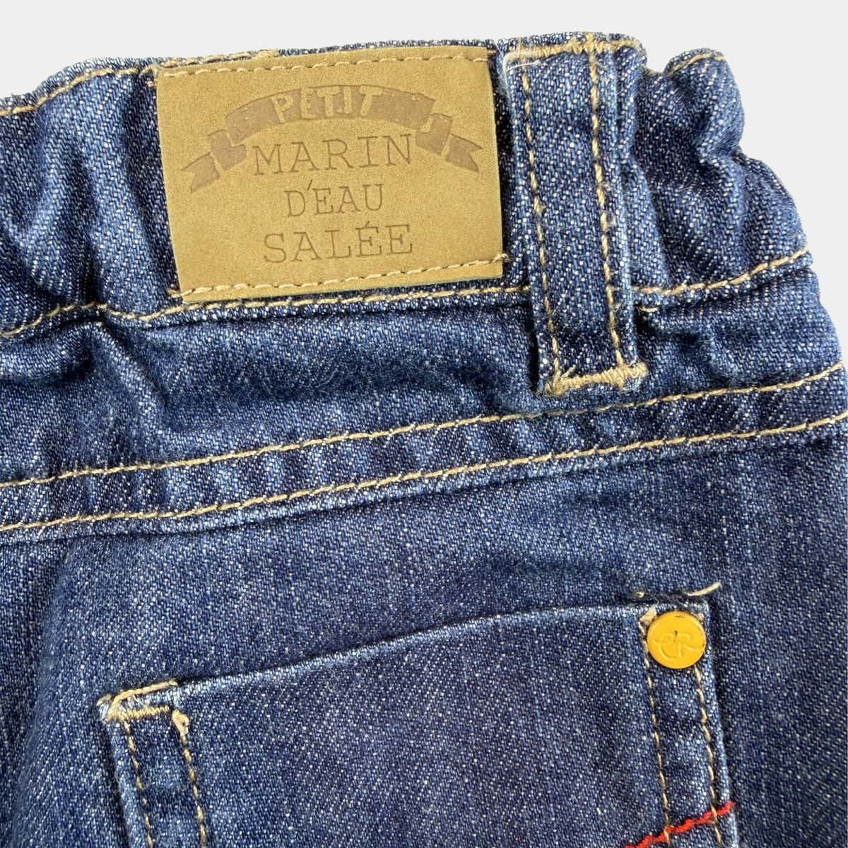 Blaue Baby-Jeans aus Denim mit Umschlag und kariertem Innenstoff – back