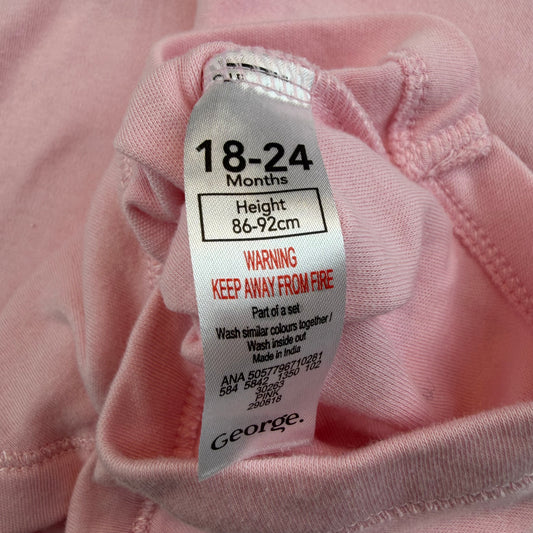Rosa ärmelloser Baby-Body mit Druckknöpfen – label