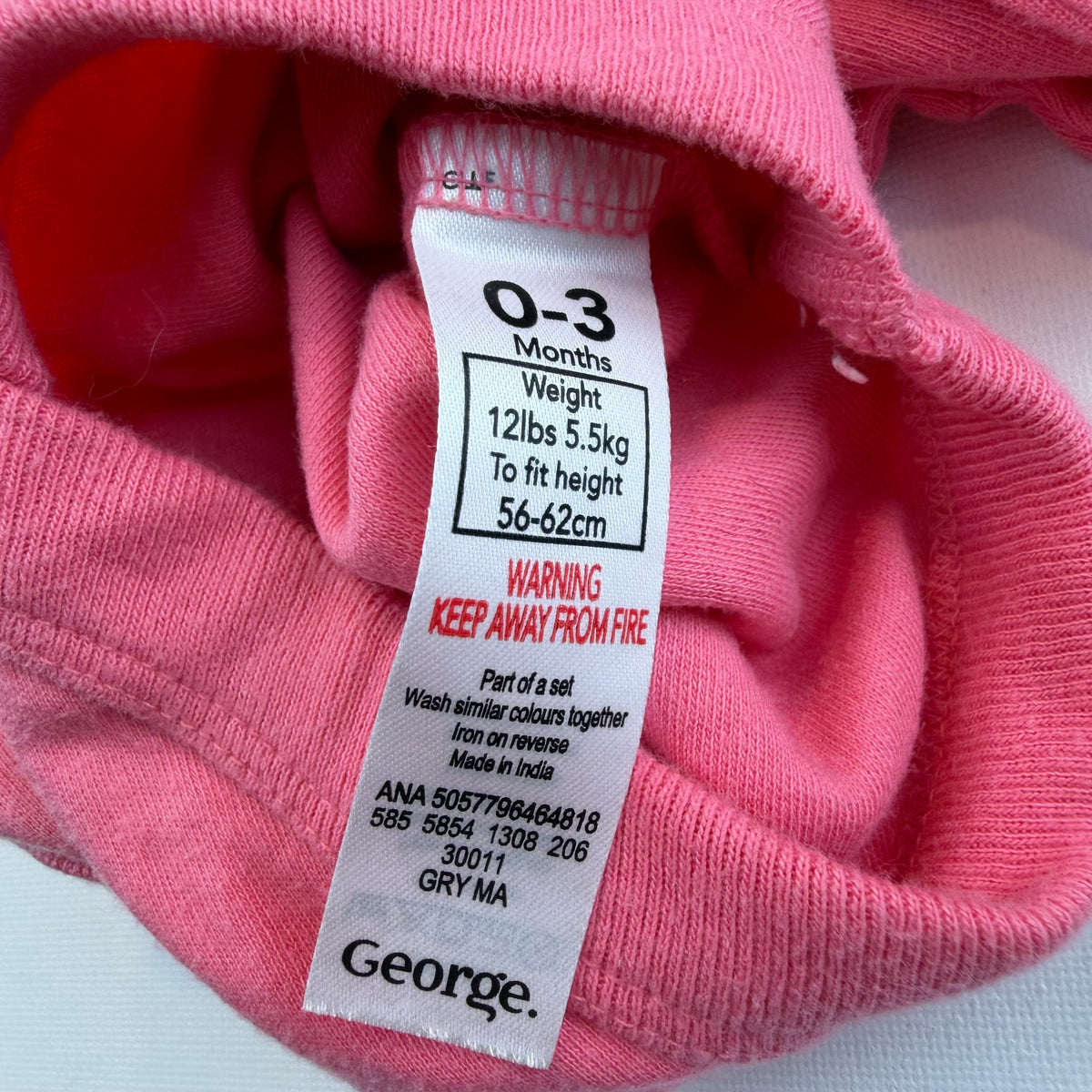Rosa Langarm-Babybody mit Schleifchen und Druckknöpfen – label