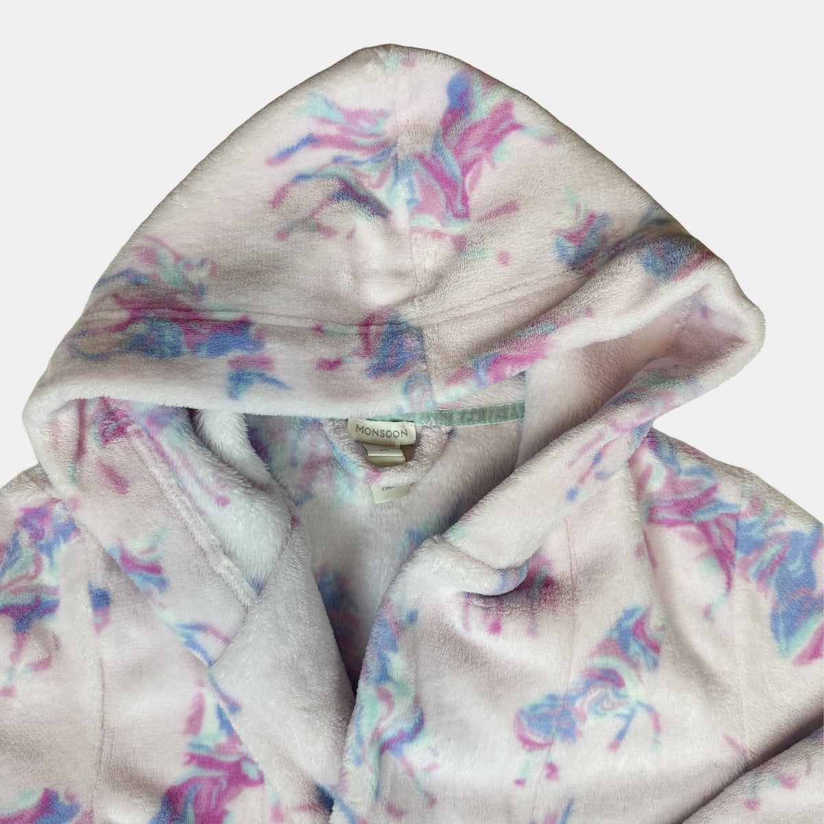 Rosa Fleece-Bademantel für Kinder mit Kapuze, Bindegürtel, Taschen und Einhornmuster – detail