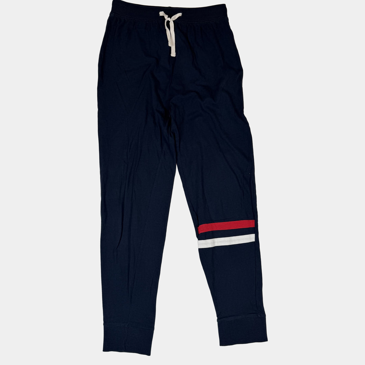 Dunkelblaue Kinder-Jogginghose mit Bindeband und rot-weißem Streifen am Bein – front