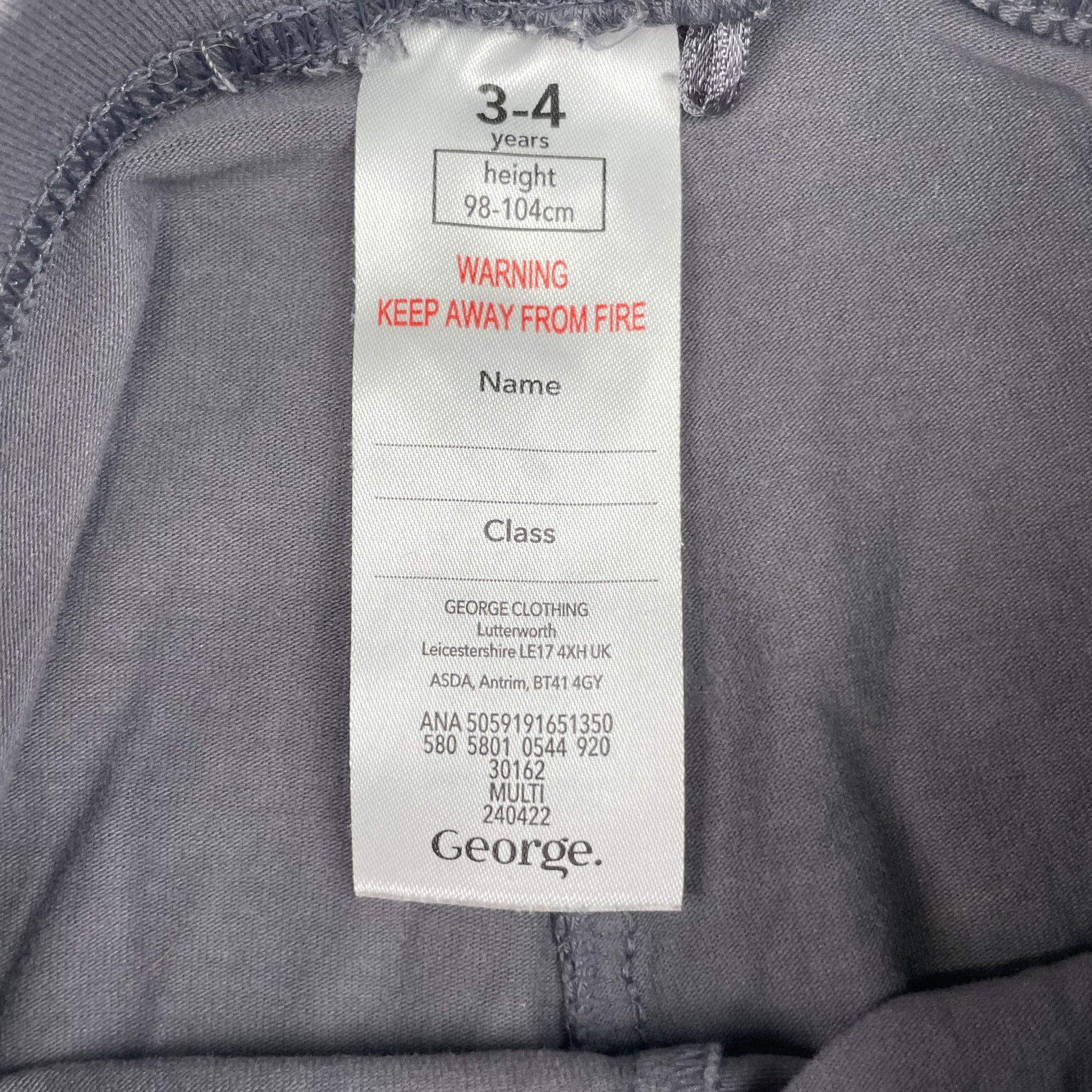 Graue Leggings aus Baumwolle mit elastischem Bund. – label