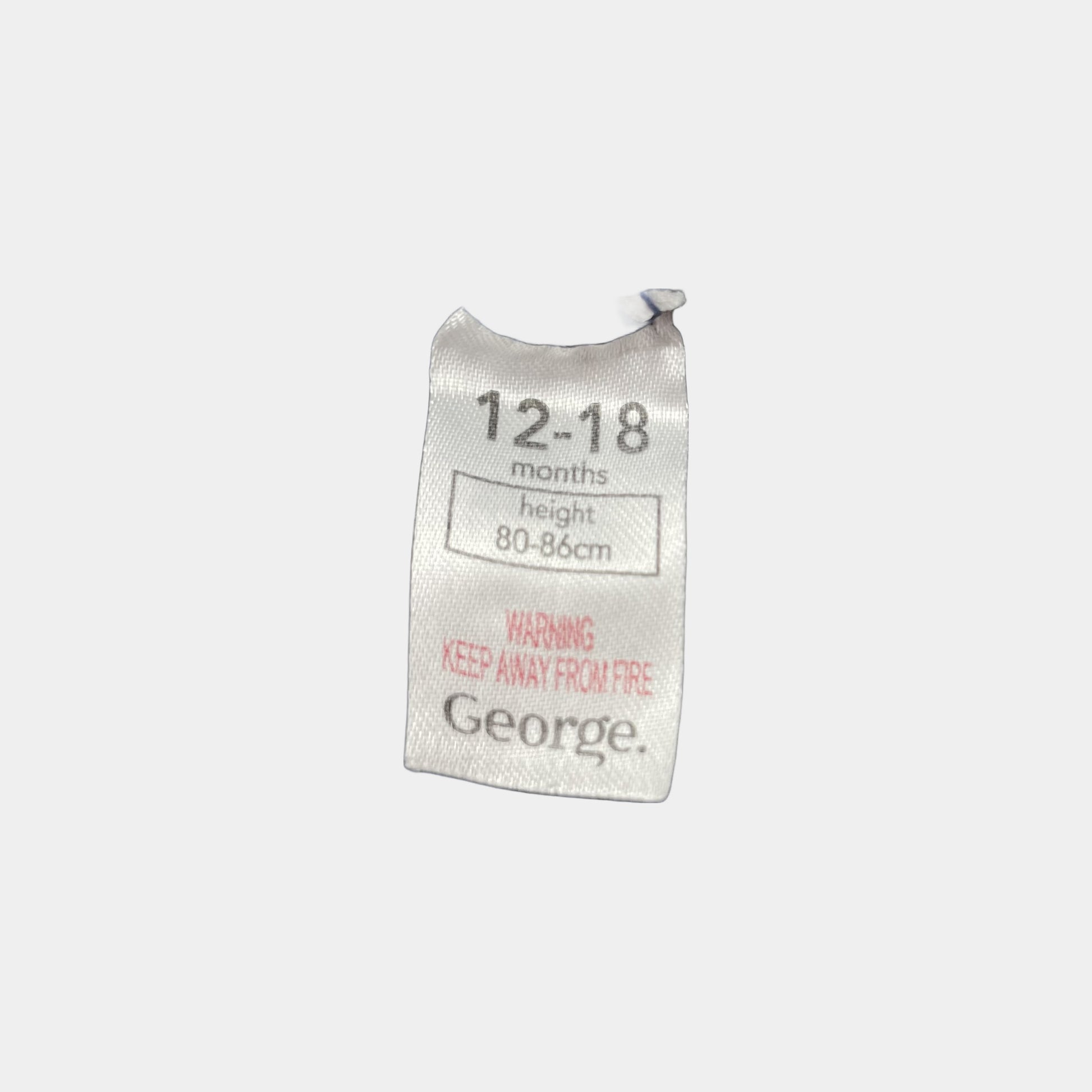 Blauer Overall mit grafischem Muster und Füßen – label