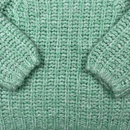 Grüner Strickpullover für Kinder im Alter von 9 Jahren mit Raglanärmeln – detail