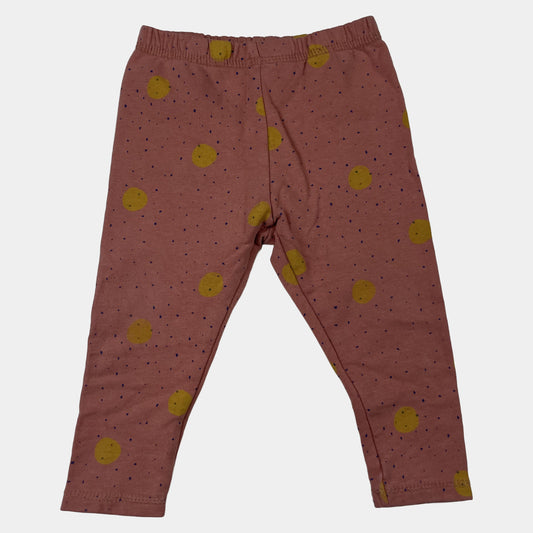 Rosa Babyhose mit gelbem Punktmuster und elastischem Bund
