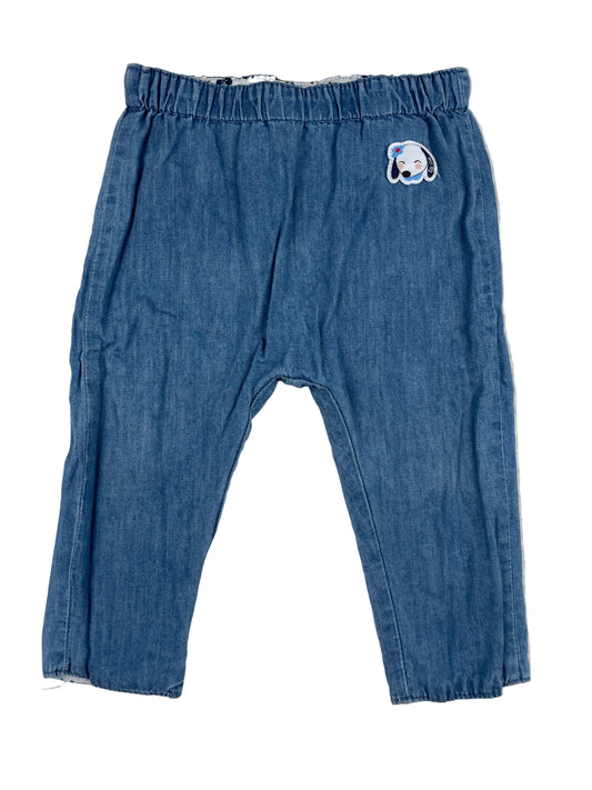 Mädchen-Wendehose, eine Seite jeansblau mit Hundemotiv, andere Seite weiß mit Blumenmuster – front