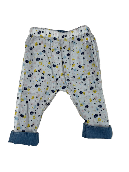 Mädchen-Wendehose, eine Seite jeansblau mit Hundemotiv, andere Seite weiß mit Blumenmuster – inside