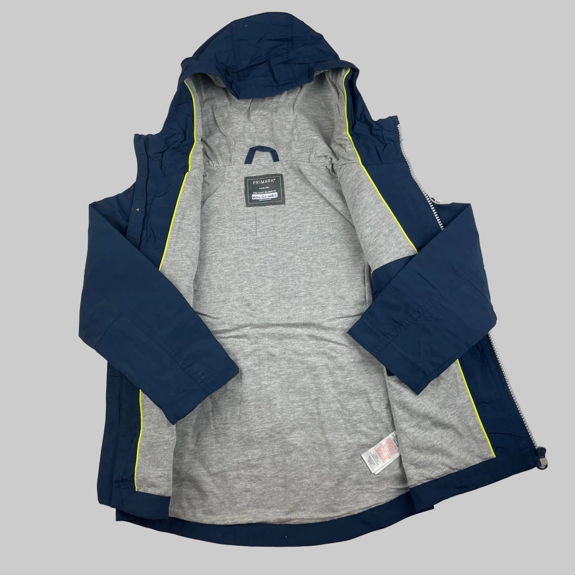 Blaue Kinderjacke mit Kapuze und Reißverschlüssen – inside