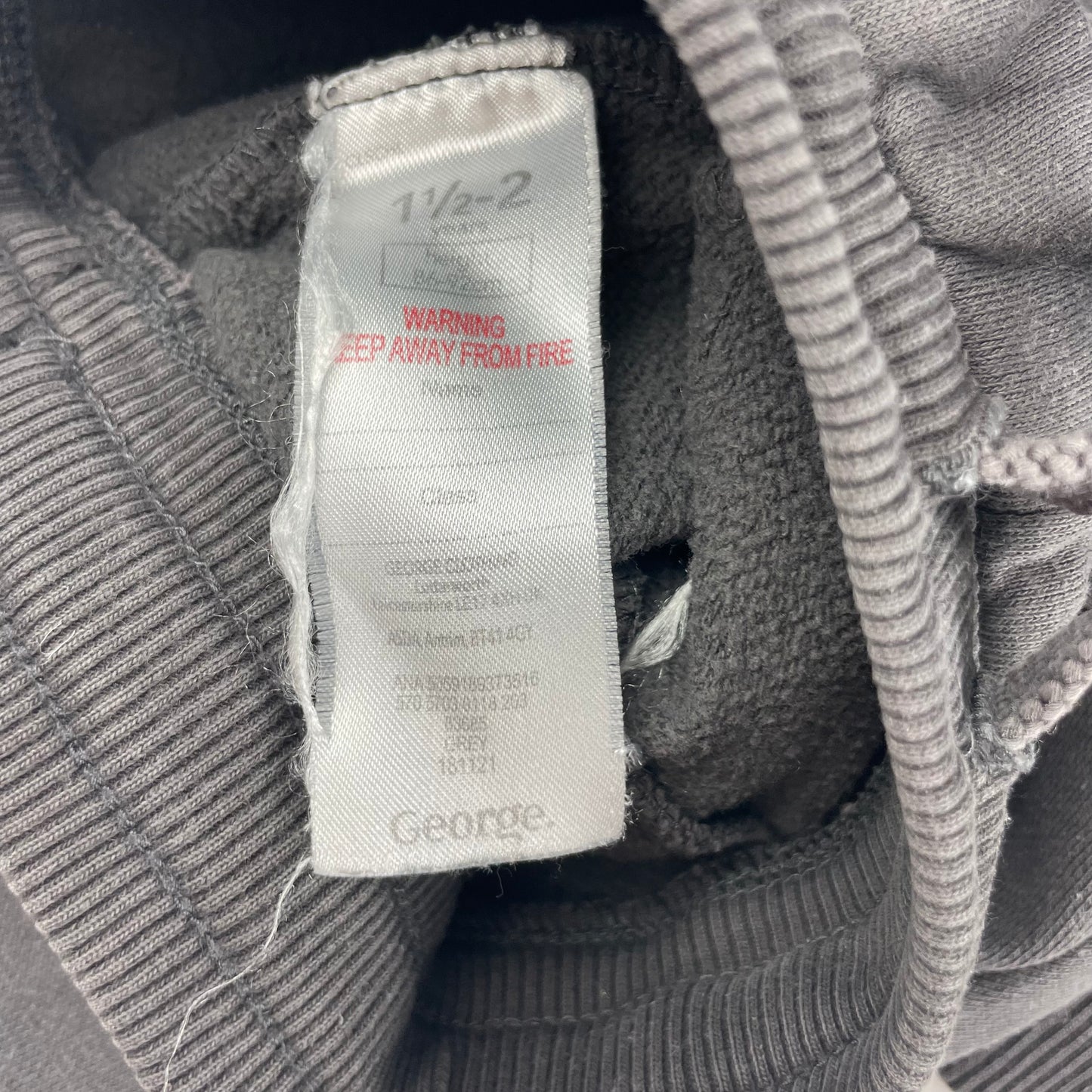 Graue Jogginghose aus Fleece mit elastischem Bund und Kordelzug – label