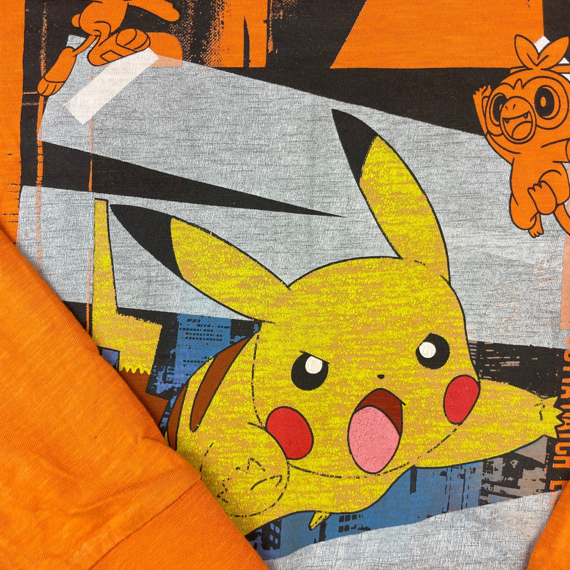 Orangenes Pokémon Langarmshirt für Kinder, Größe 10 Jahre – detail
