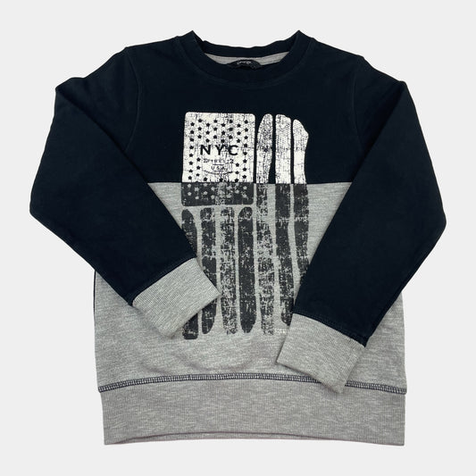 Schwarzer Pullover aus Baumwolle in Größe 7-8 Jahre mit grauem Blockdesign und NYC-Motiv. – front